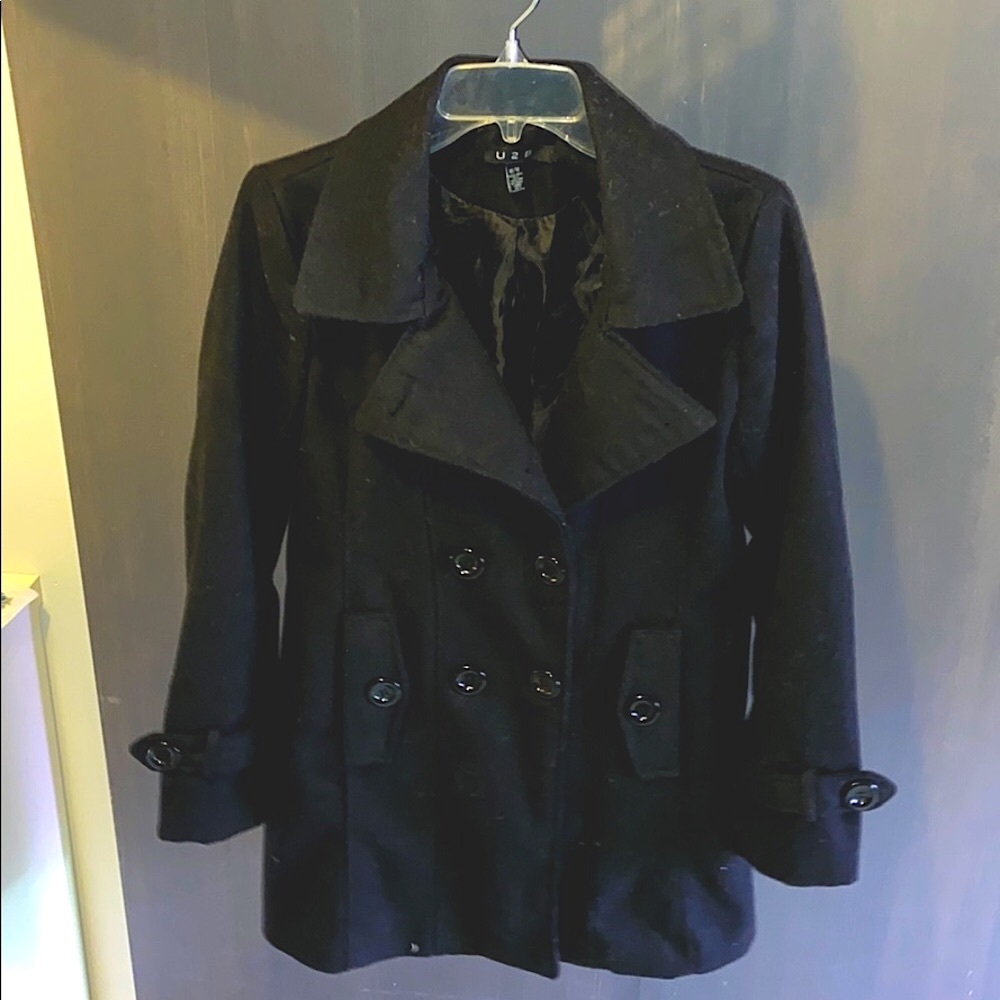 Women’s Black dress jacket.